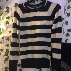 Black and cream colored long sleeve